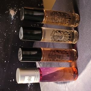 4 Scented Oil Roll Ons. Black Opium, Moonlight, Fire Goddess & Arabian Nights